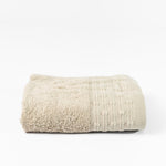 
                    
                      Toalla de algodón beige con textura rizada y ribete decorativo-beige
                    
                  