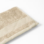
                    
                      Toalla beige Honeycomb con textura de panal absorbente-beige
                    
                  