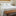 Cama con cubrecama blanco Lugano y almohadas decorativas-natural