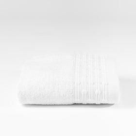 Toalla blanca de algodón con textura natural y acabado elegante-natural