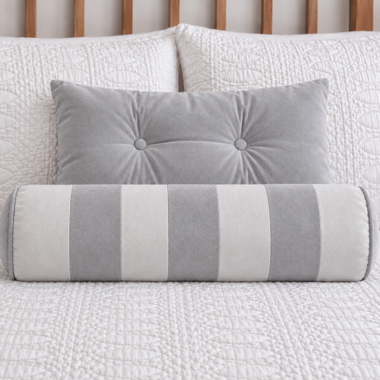 cojin decorativo cilíndrico de tela de pana-gris