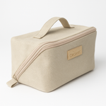 
                    
                      Bolsito organizador beige de tela con asa y etiqueta orgánica-
                    
                  