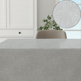 Mantel gris claro sobre mesa con silla y planta decorativa-gris