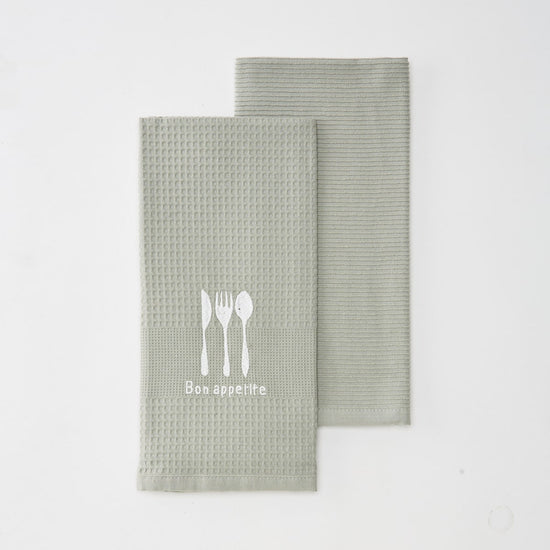 Set de dos repasadores verdes con diseño de cubiertos y texto Bon appetit-verde