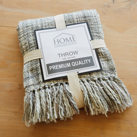 Manta tejida gris con flecos y etiqueta Home Collection Premium Quality-gris