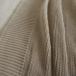 
                    
                      Manta Ginger beige con textura de tejido acanalado y pliegues-beige
                    
                  