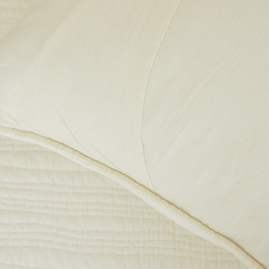Funda de almohón Lagos natural en tono blanco crema con textura suave-natural