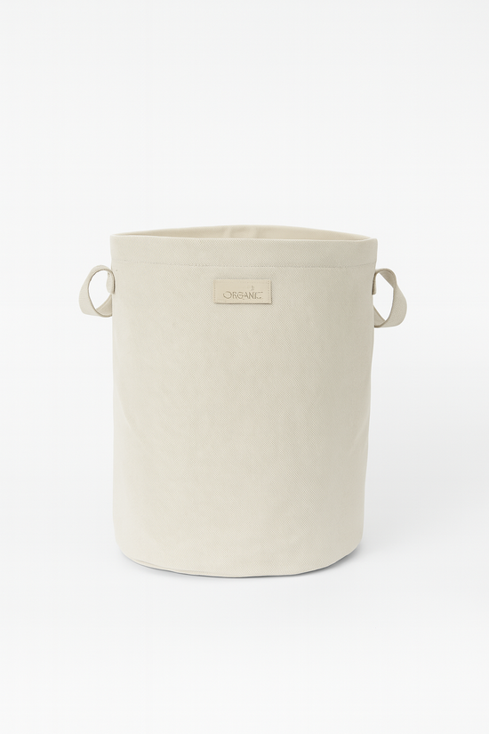 Contenedor cilíndrico beige de tela con asas y etiqueta orgánica-natural