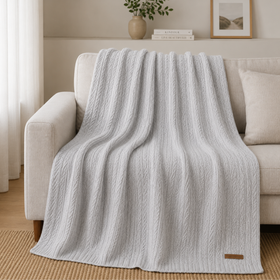 Manta de lana gris con patrón de líneas texturizadas y etiqueta Home Harmony-gris