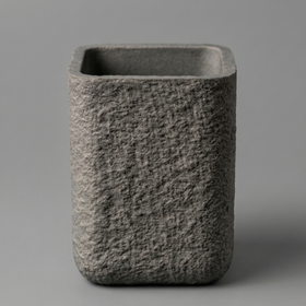 Portacepillo de cemento rectangular gris con textura rugosa-gris