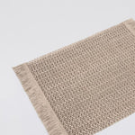 
                    
                      Individual rectangular tejido beige con flecos decorativos-
                    
                  