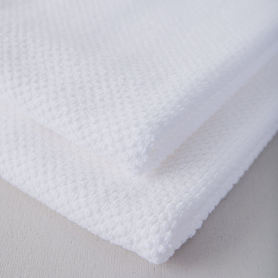 Detalle de textura de repasadores blancos Home Collection suave-blanco/blanco